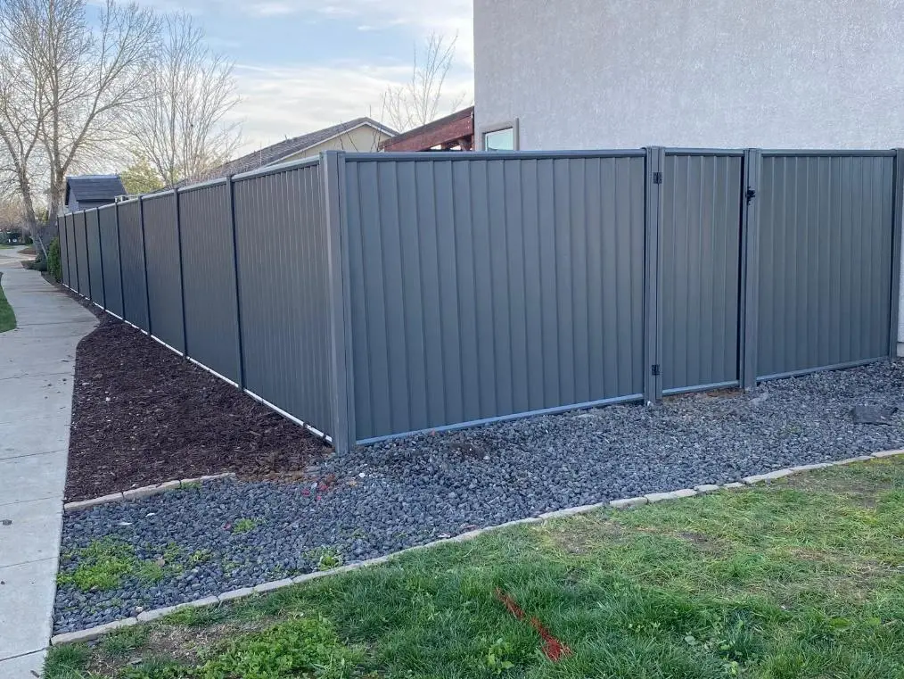 Fire-resistant steel fence complying with California’s new Zone 0 wildfire regulations.