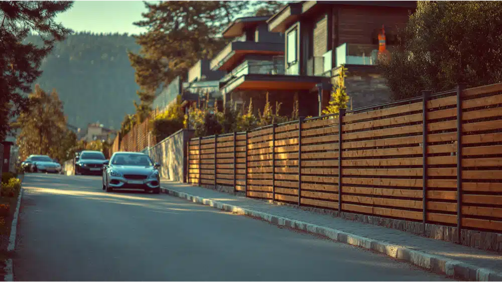 Wood fence aound a beautiful house