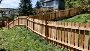 How Do Contractors Design Custom Fences for Uneven Terrain