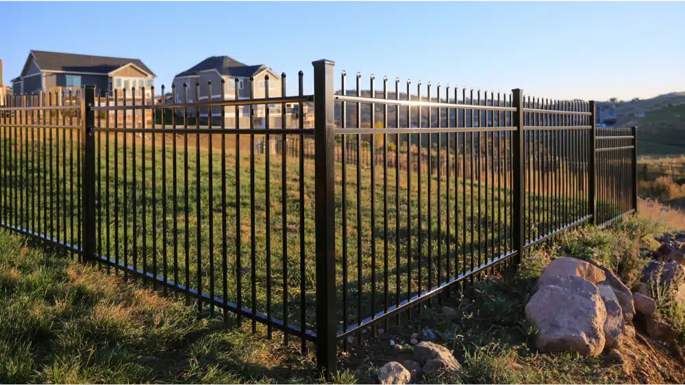 Ornamental fence on sloped yard